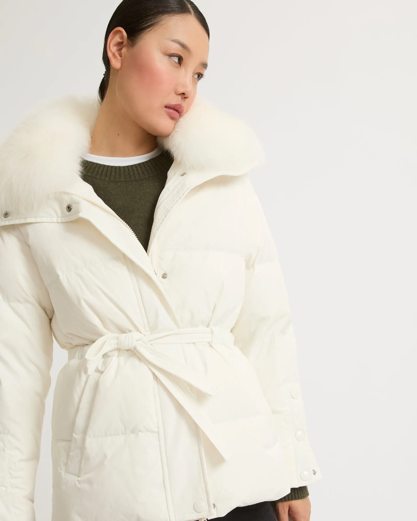 Belted technical fabric down jacket with detachable fox fur collar